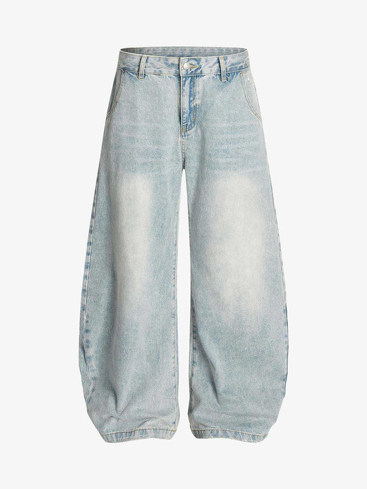 Jeans de mezclilla lavada y desgastada con corte recto