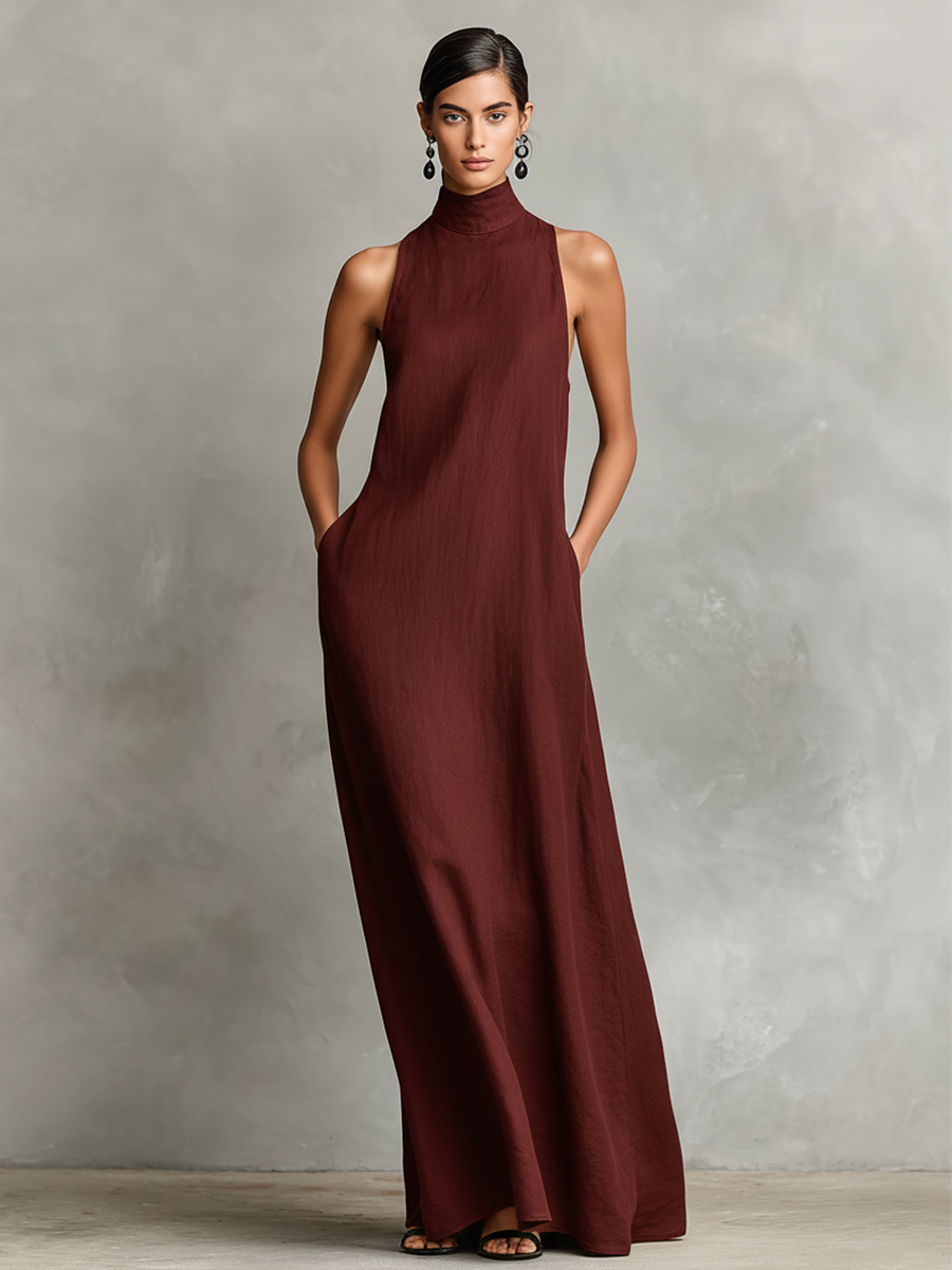 Vestido largo de lino con cuello alto y bolsillos laterales